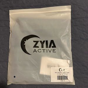 ZYIA Blue Metallic Light n Tight Hi-Rise 7/8, size 12, NWT and Bag